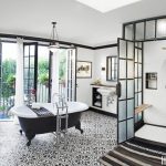 Granada Tile's black and white Cluny cement tiles pave the way for a glamorous bathroom designed by Dierdre Doherty