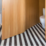 Architect Barbara Bestor combined Granada Tile's Santander and Serengeti cement tiles for a bright bathroom. Photo by Laure Joliet