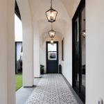 Cluny cement tiles in in-stock black and white encircle the courtyard of a Denton Developments project