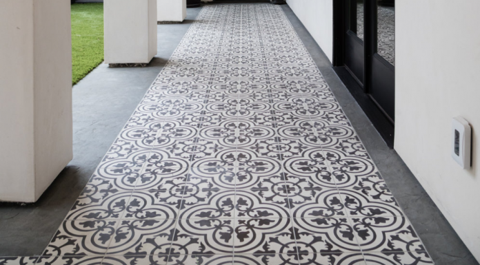 Cluny cement tiles in in-stock black and white encircle the courtyard of a Denton Developments project