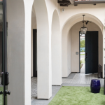 Cluny cement tiles in in-stock black and white encircle the courtyard of a Denton Developments project