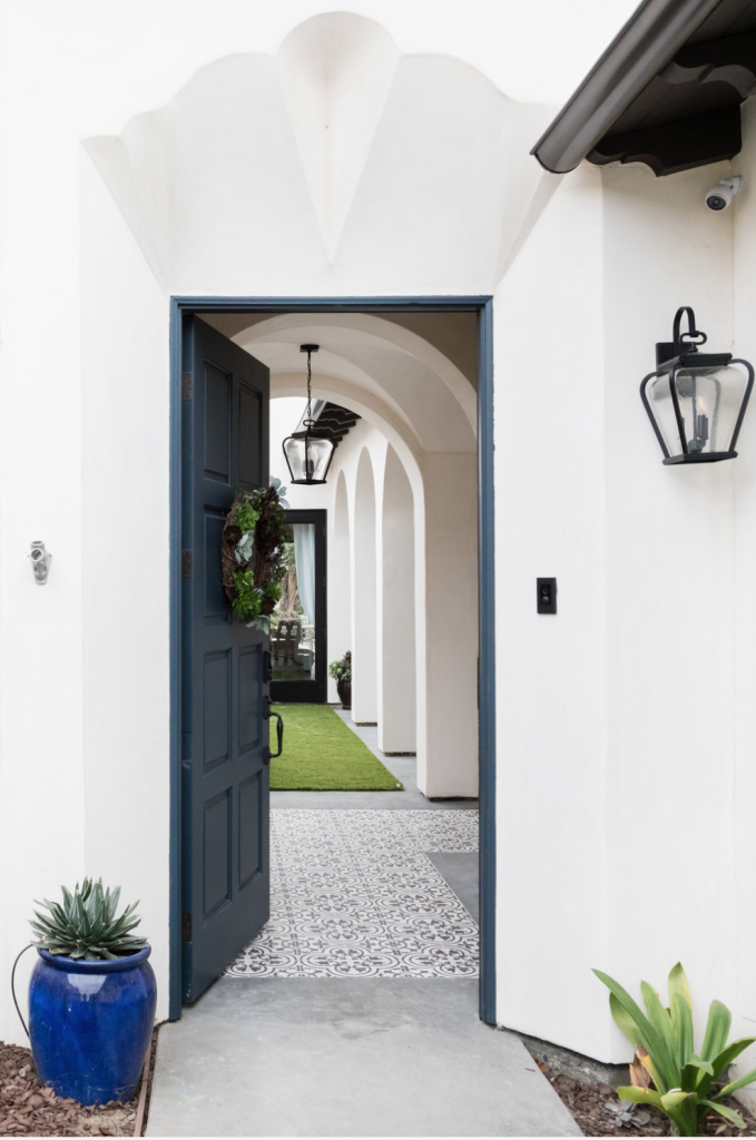 Cluny cement tiles in in-stock black and white encircle the courtyard of a Denton Developments project