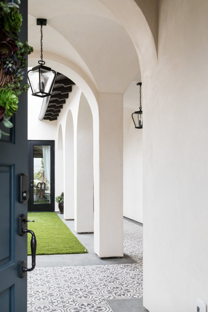 Cluny cement tiles in in-stock black and white encircle the courtyard of a Denton Developments project