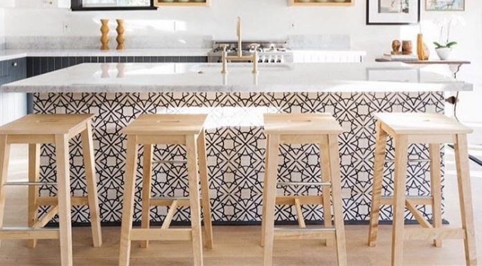 In a kitchen designed by ModOp and Better Shelter, Granada Tile's Madesimo cement tiles transform an all white space