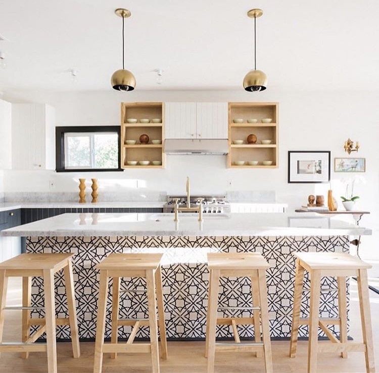 In a kitchen designed by ModOp and Better Shelter, Granada Tile's Madesimo cement tiles transform an all white space