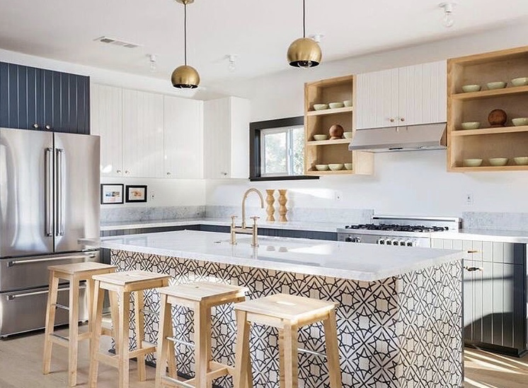 In a kitchen designed by ModOp and Better Shelter, Granada Tile's Madesimo cement tiles transform an all white space