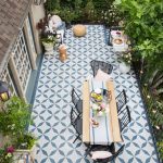 Geometric patterned cement tile in outdoor patio
