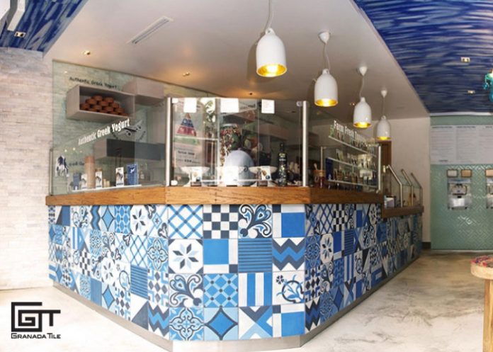 Blue, black, and white patchwork tile design in a Greek Yogurt business