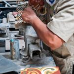 Man creating Encaustic tiles