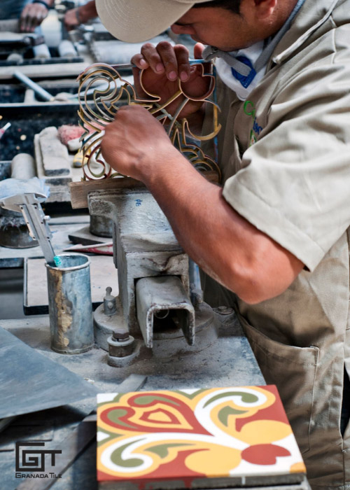 Man creating Encaustic tiles