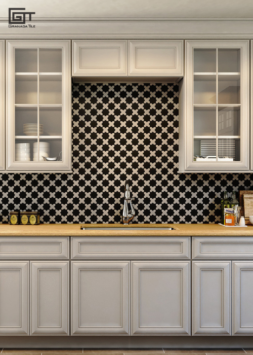 A kitchen with star and cross cement tiles on the wall