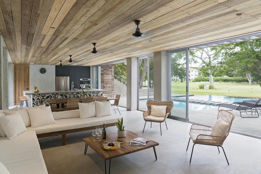 Family room with a couch, table, and chairs