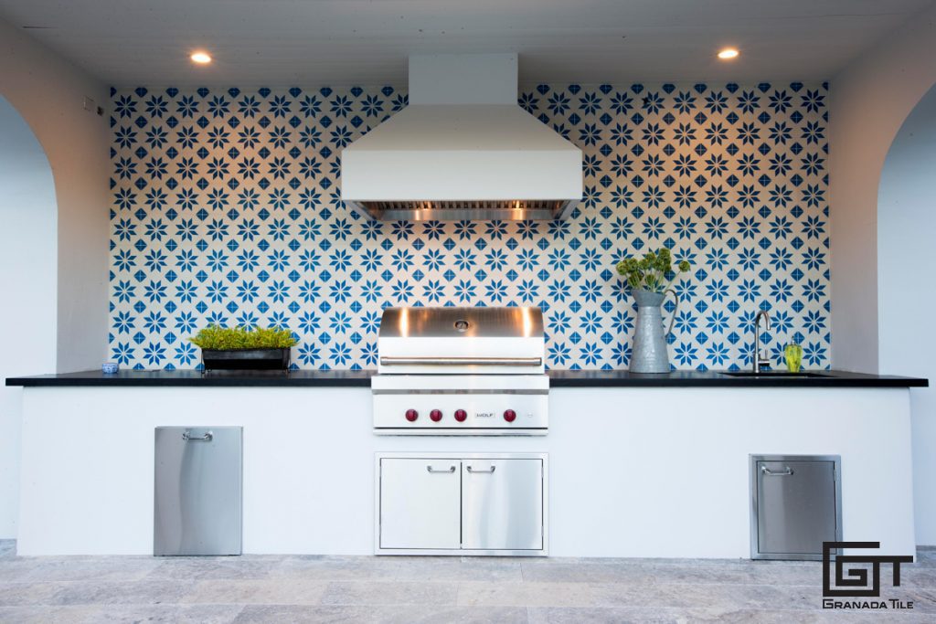 Outdoor kitchen with cement tile wall