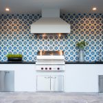 Outdoor kitchen with cement tile wall