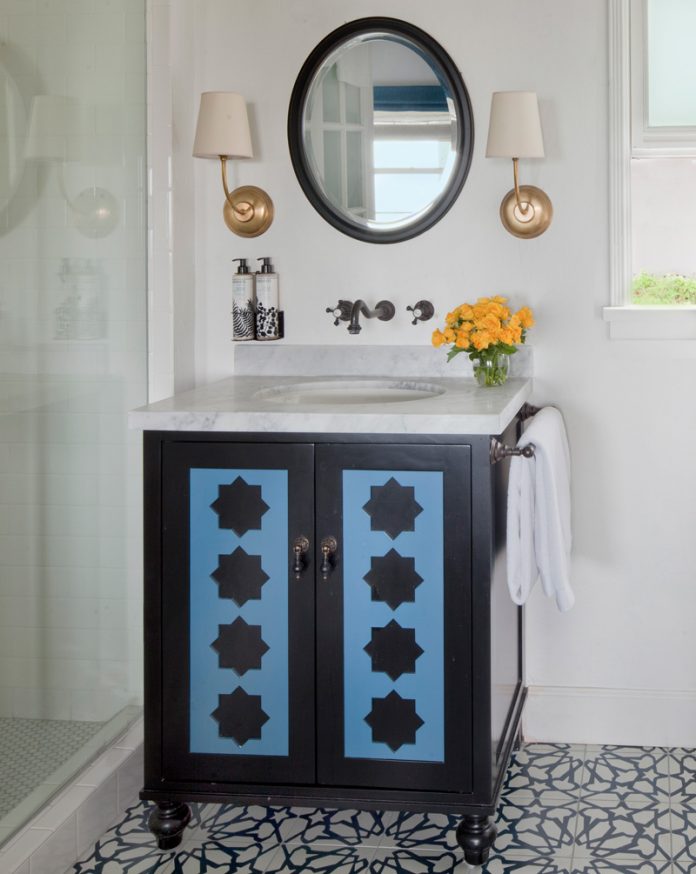 A bathroom sink with an Alhambra pattern from Granada Tile's Echo collection