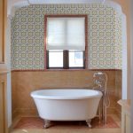 Designer Paul Schatz uses Granada Tile's cement tile pattern, Flor, to create a classic and elegant bathroom design