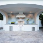 Granada Tile’s Calais pattern installed across an outdoor patio wall