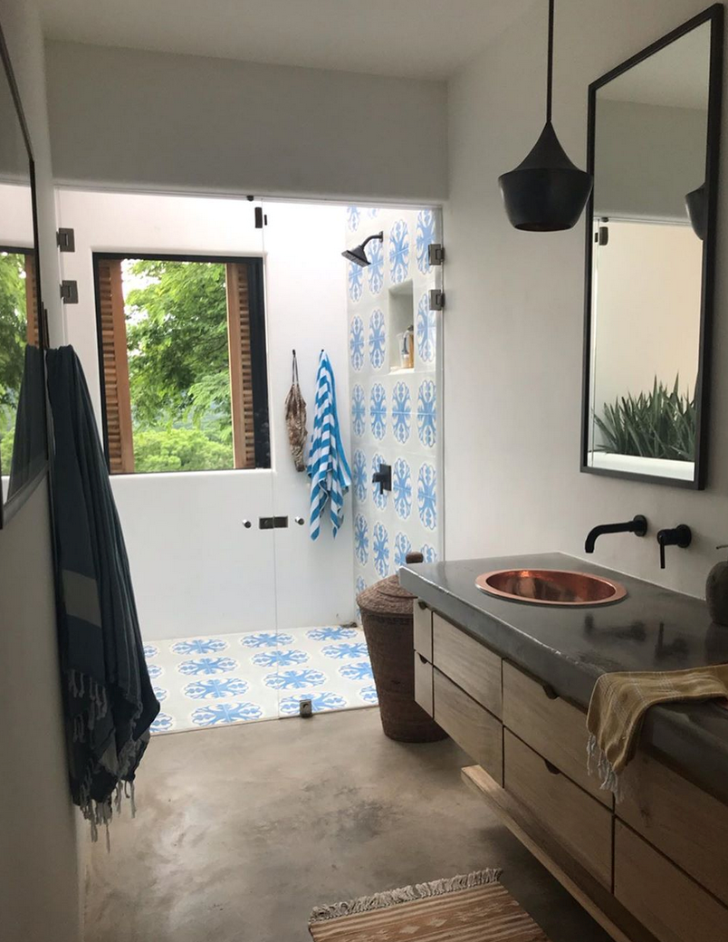 cement flooring by lining the shower with vibrant Napoli 51 A cement tiles