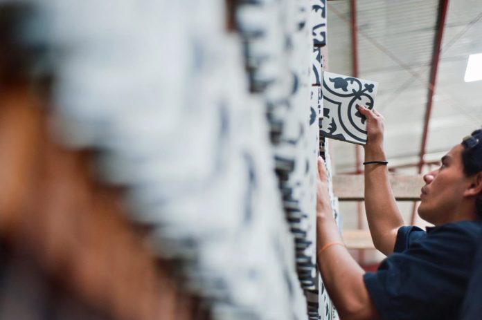 A Tile Manufacturer worker creating tiles