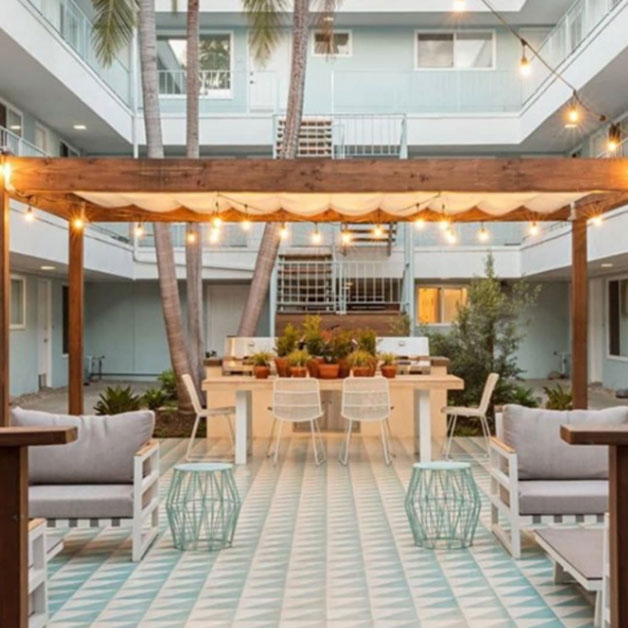 Mediterranean vibe to this luxury homes outdoor space
