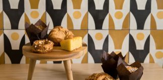 Granada Tile's Stockholm pattern on the wall next to baked goods on a table