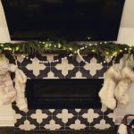 A Christmas fireplace using Badajoz tiles made by The Wardrobe House