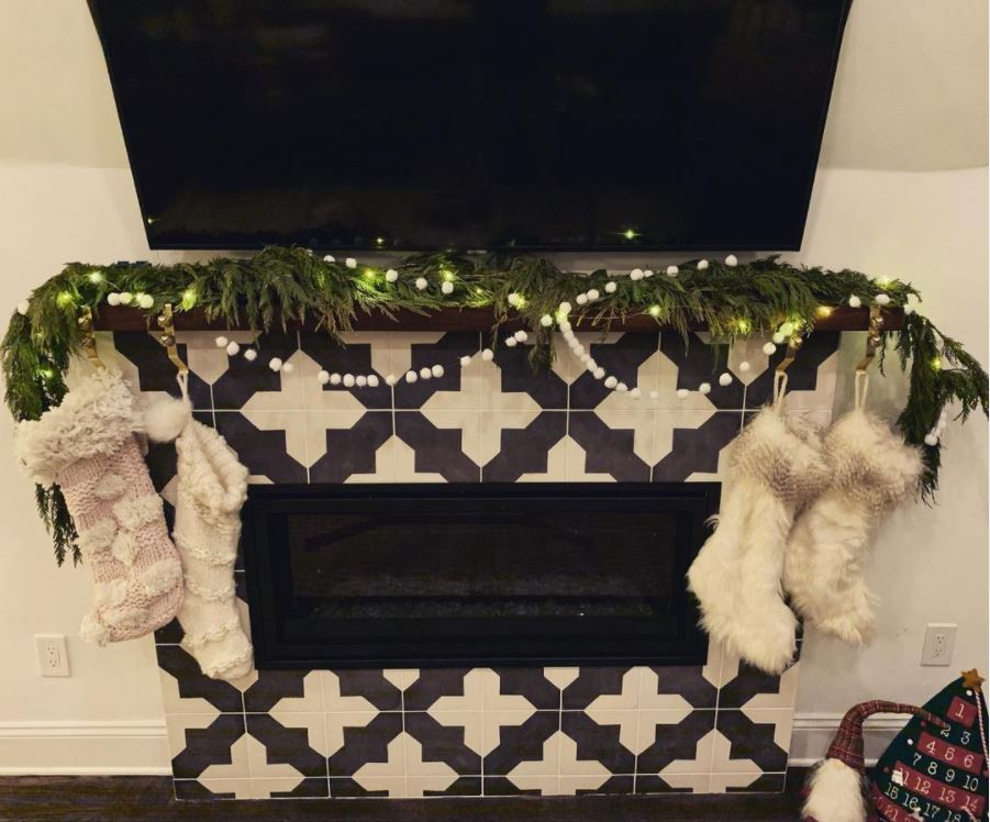 A Christmas fireplace using Badajoz tiles made by The Wardrobe House