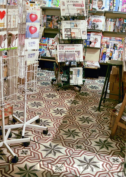 Bookstore in Paris with compass-themed historical cement tiles